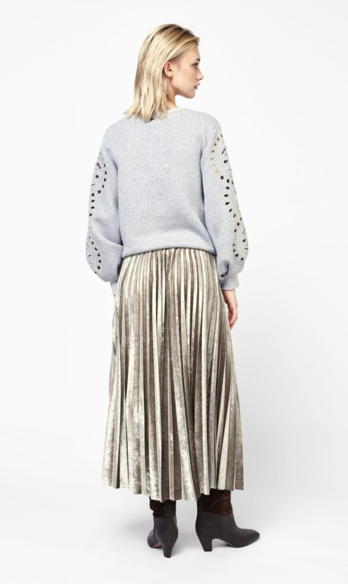 Mid-length pleated metallic skirt