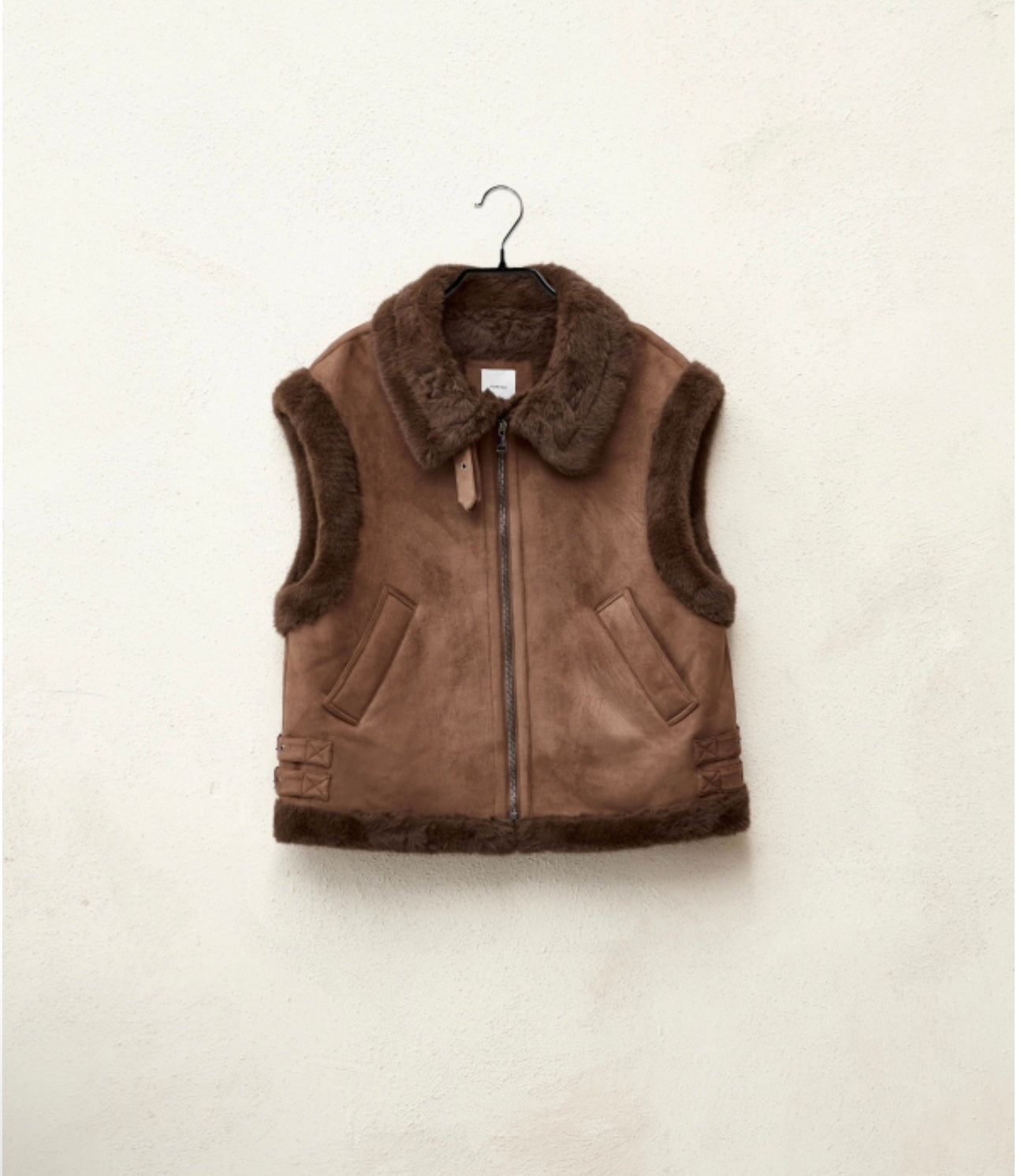 Combined synthetic fur vest