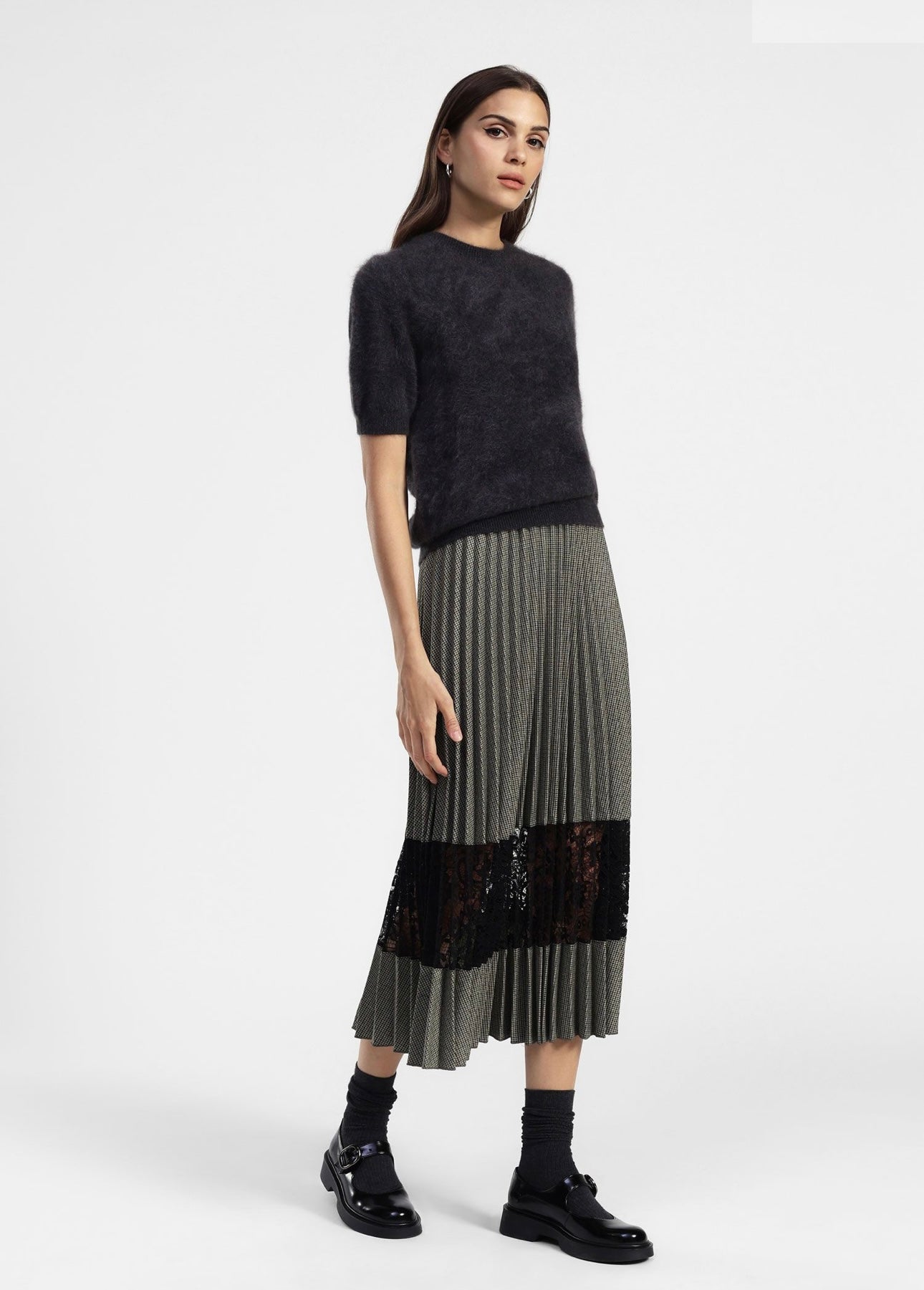 Mid-length pleated skirt with lace panel