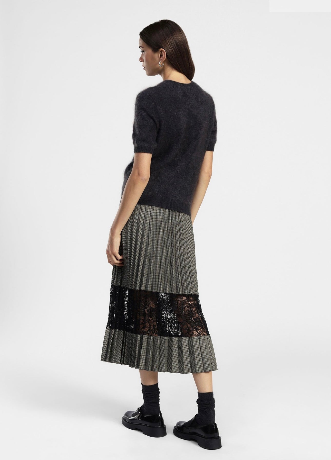 Mid-length pleated skirt with lace panel