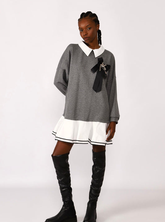 Sweatshirt dress with brooch